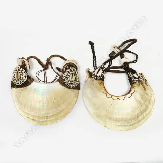 Two PNG kina shell breastplates,